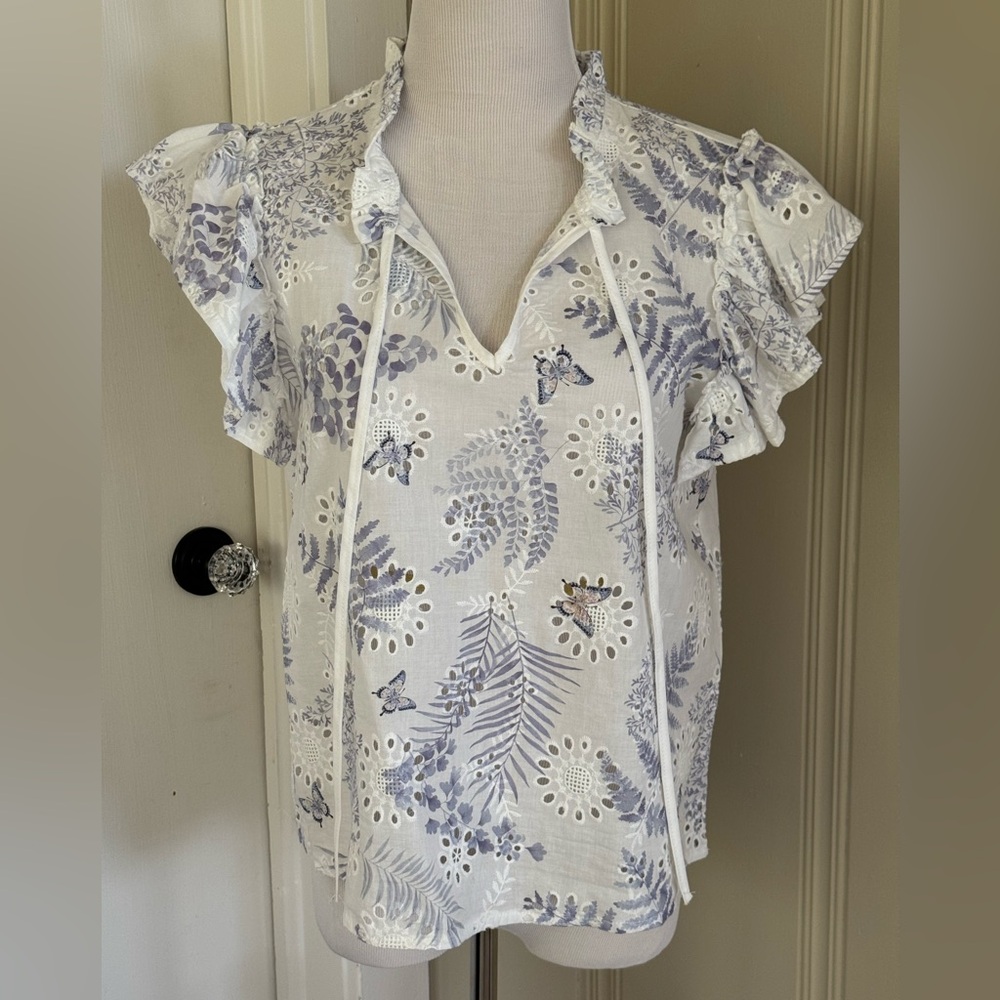 Solitaire eyelet ruffle sleeve top